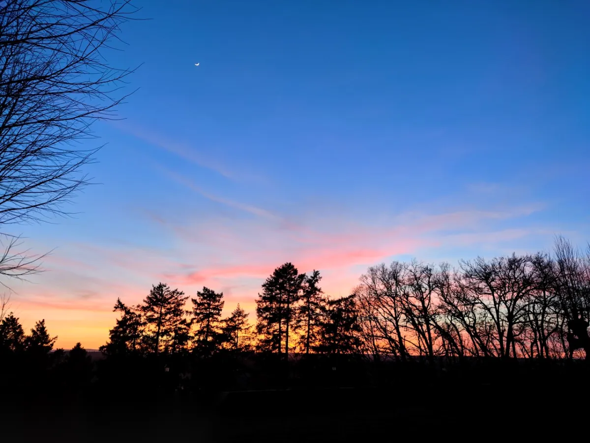 Sunset and moonrise over the estate