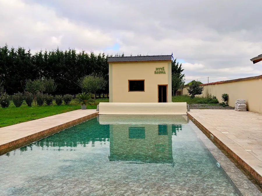 Pool and sauna area in summer