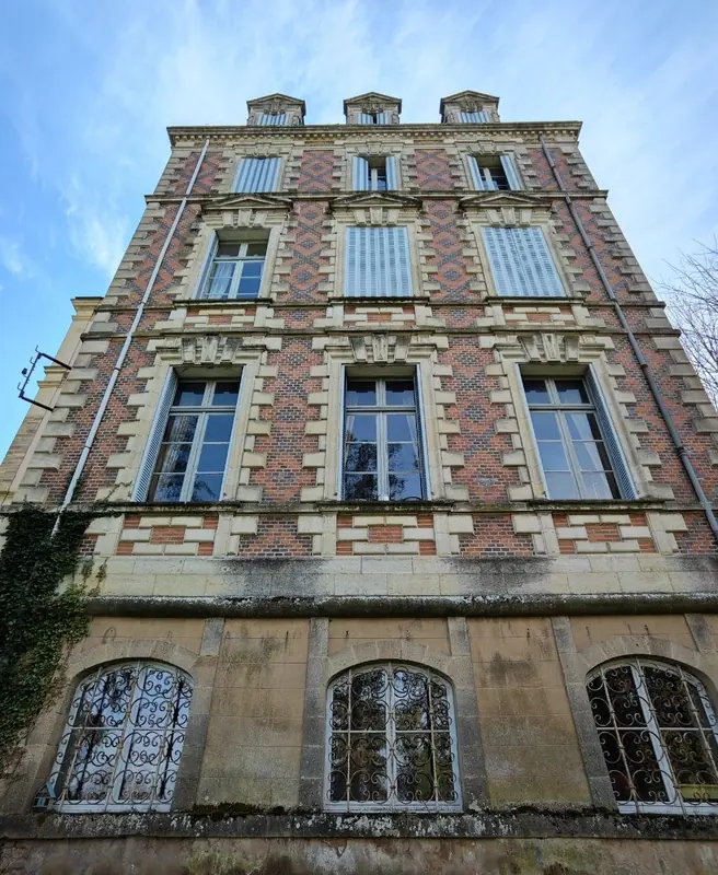 Diamond brickwork across the pavilion elevation