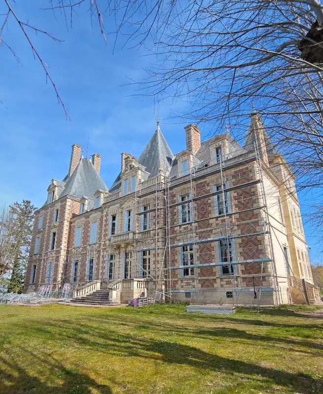 The brick elevation under a deep blue sky