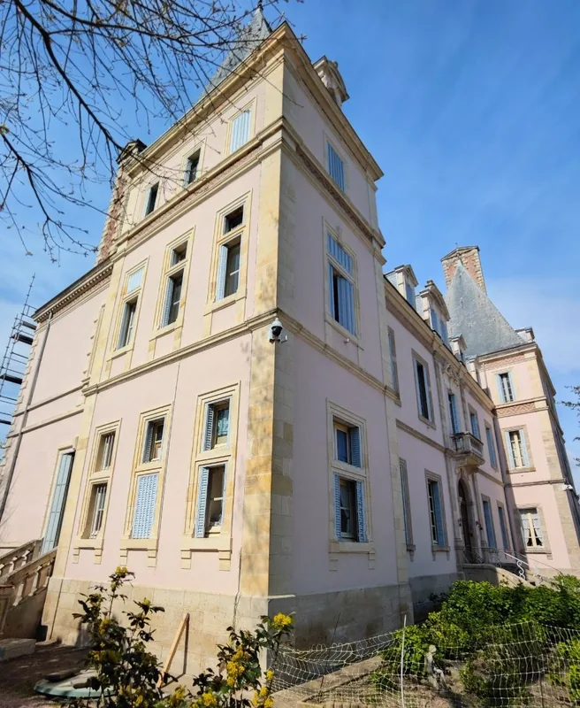 The rendered wing seen between the trees