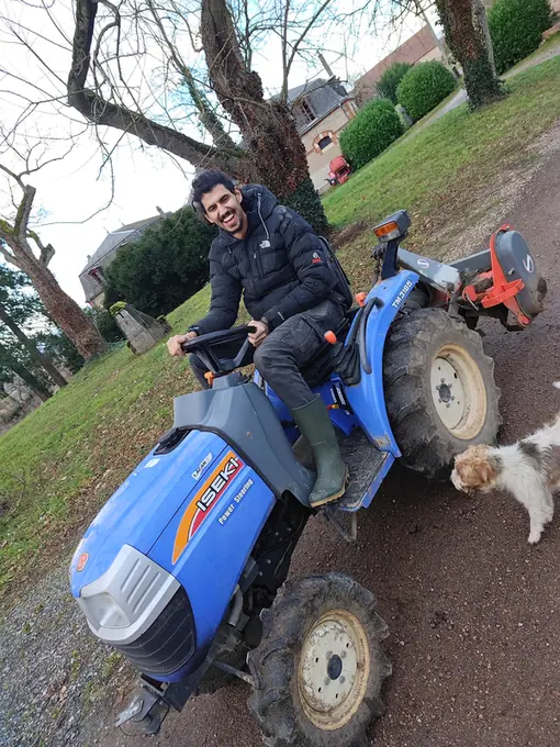 The estate tractor on the gravel drive