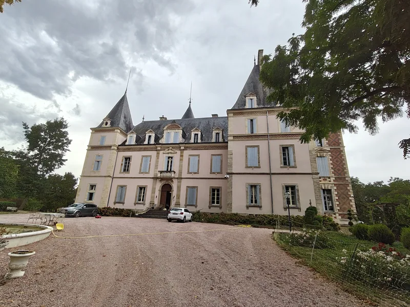 The full frontage under a soft overcast sky