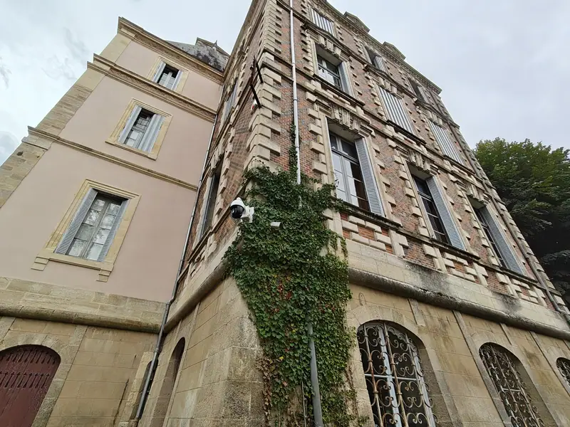 Ivy climbing the pavilion corner where restoration has yet to reach