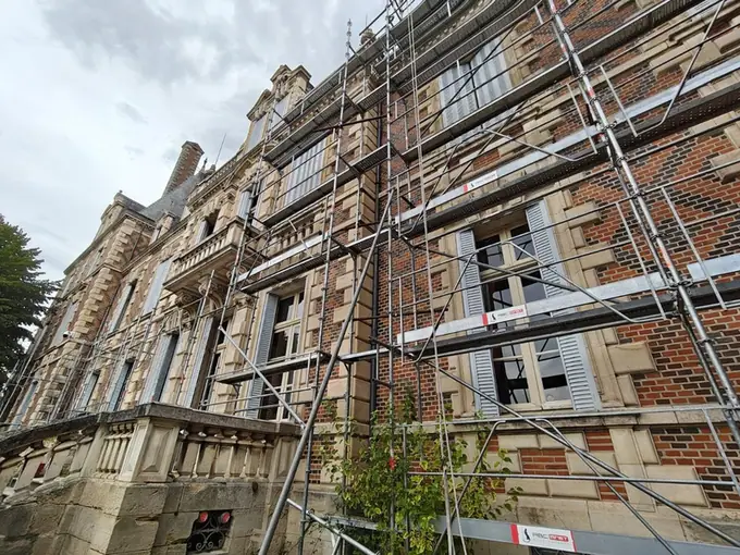 Restoration work underway on the upper storeys